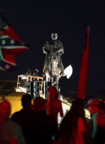 A statue of Confederate Gen. P.G.T. Beauregard is prepared for removal from the entrance to City Park in New Orleans, Tuesday, May 16, 2017. (AP/Scott Threlkeld)