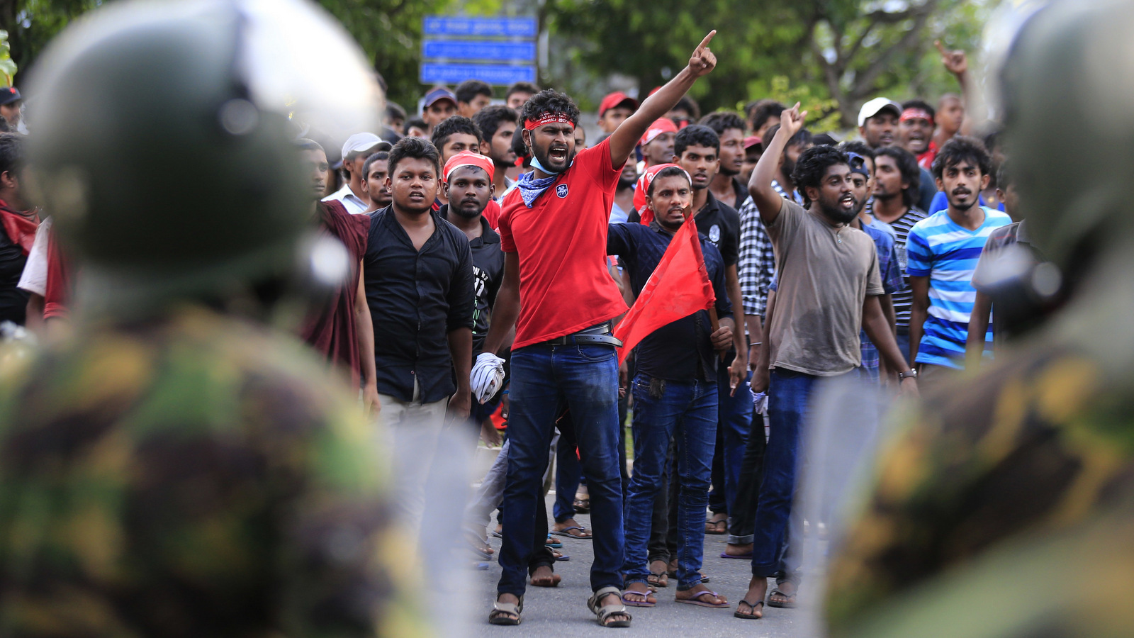 Sri Lankan university students parade shouting anti government slogans during a protest in Colombo, Sri Lanka, Wednesday, May 17, 2017. Police fired tear gas at thousands of students protesting against a private medical university they say could jeopardize the nation's tradition of state-funded education. (AP/Eranga Jayawardena)