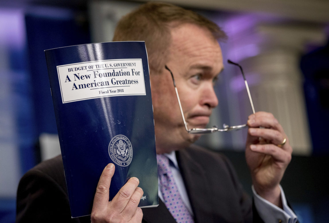 Budget Director Mick Mulvaney holds up a copy of President Donald Trump's proposed fiscal 2018 federal budget. (AP/Andrew Harnik)