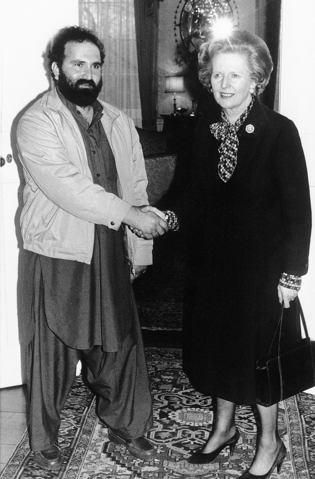 Afghan rebel leader Abdul Haq, commander of the Hesb-I-Islami resistance party, with Margaret Thatcher at No. 10 Downing Street in London, March 11, 1986. (AP/Press Association)