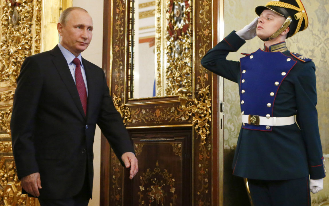 Russian President Vladimir Putin, left, walks past an honour guard before a meeting with his Brazilian counterpart Michel Temer at the Kremlin, in Moscow, Russia, June 21, 2017. (Sergei Karpukhin/AP)