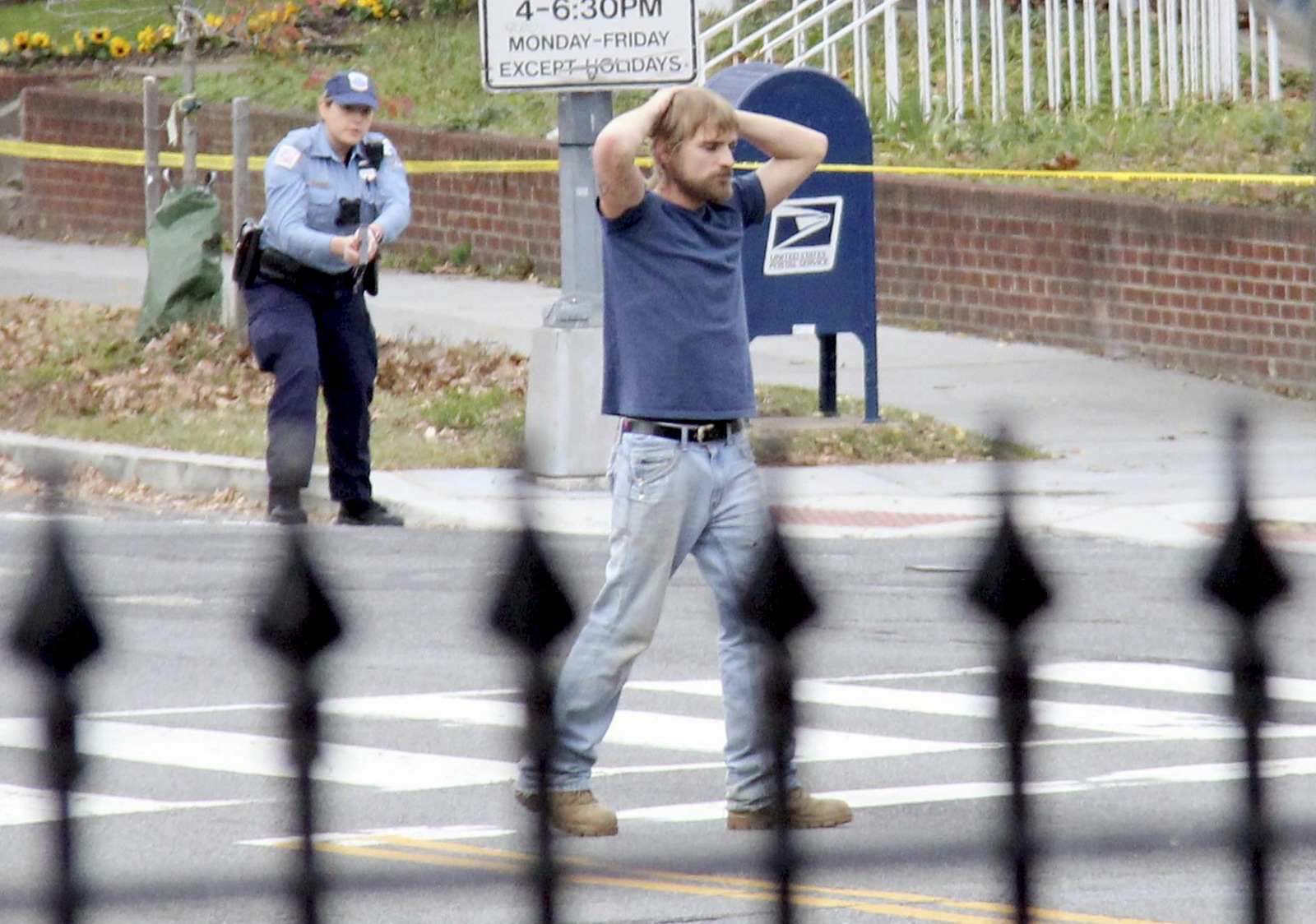 FILE - In this Dec. 4, 2016 file photo, Edgar Maddison Welch, 28 of Salisbury, N.C., surrenders to police in Washington. Welch, a man who police said was inspired by false internet rumors dubbed “pizzagate” to fire an assault weapon inside a Washington pizzeria. March 24, 2017 (Sathi Soma/AP)