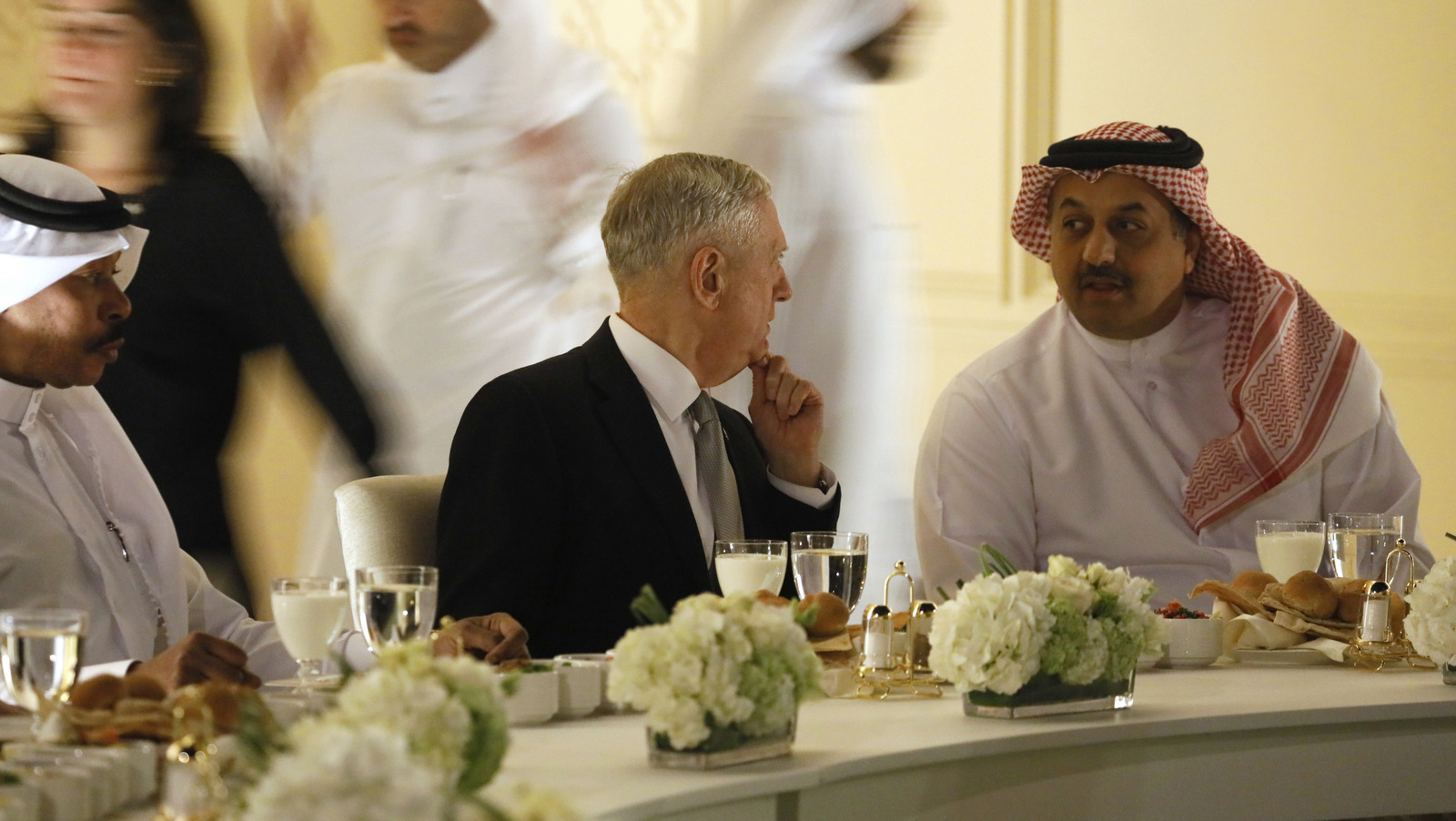 Qatar's Minister of Defense Khalid bin Mohammad Al-Attiyah, right, welcomes U.S. Defense Secretary James Mattis at his residence in Doha, Qatar, Saturday April 22, 2017. (Jonathan Ernst/AP)