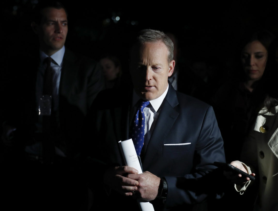 White House press secretary Sean Spicer talks to media as he walks to the West Wing of the White House, in Washington, May 9, 2017. (AP/Carolyn Kaster)