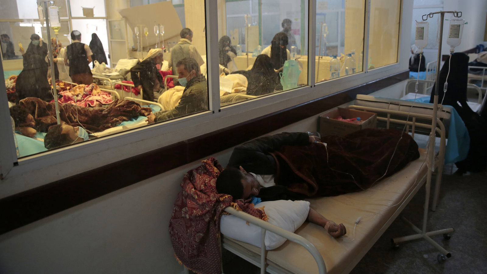 People are treated for suspected cholera infection at a hospital in Sanaa, Yemen, May. 15, 2017. While cholera is easily treated, the Saudis’ ongoing blockade has crippled Yemen’s health system, making it unable to respond to the crisis.(AP/Hani Mohammed)