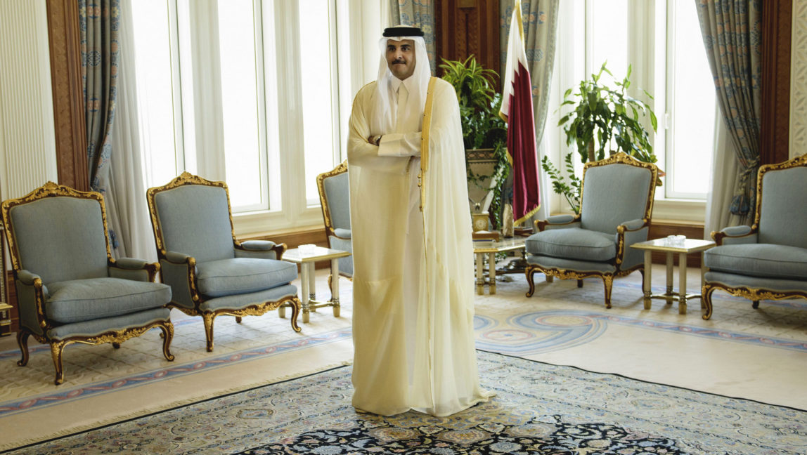 Qatar Emir Sheik Tamim bin Hamad Al-Thani waits for the arrival of U.S. Secretary of State John Kerry ahead of their meeting, at Diwan Palace in Doha, Qatar. (Brendan Smialowski/AP)