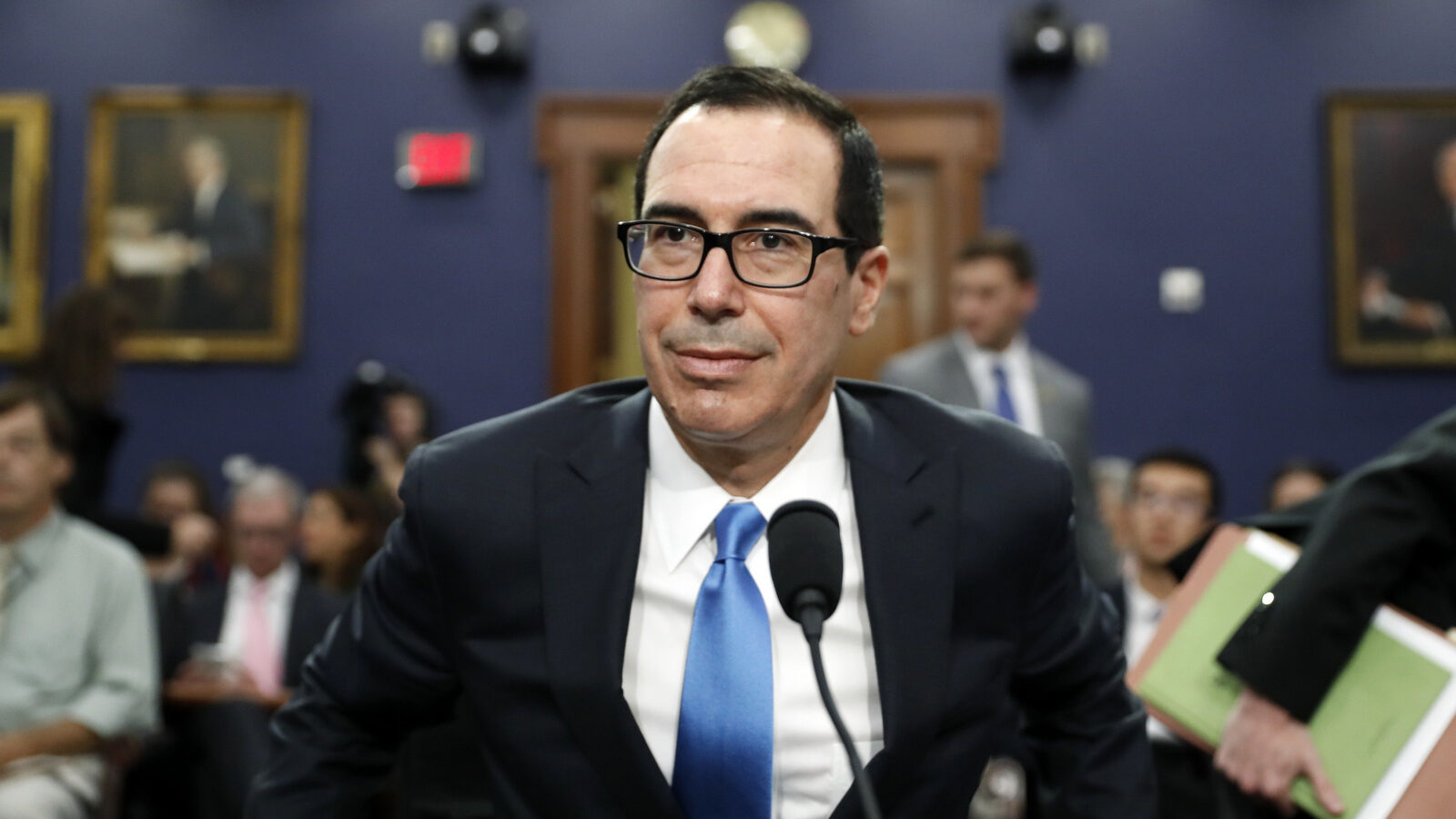 Treasury Secretary Steven Mnuchin takes his seat to testify at a House Appropriations subcommittee hearing on the budget, on Capitol Hill, June 12, 2017, in Washington. (AP/Alex Brandon)