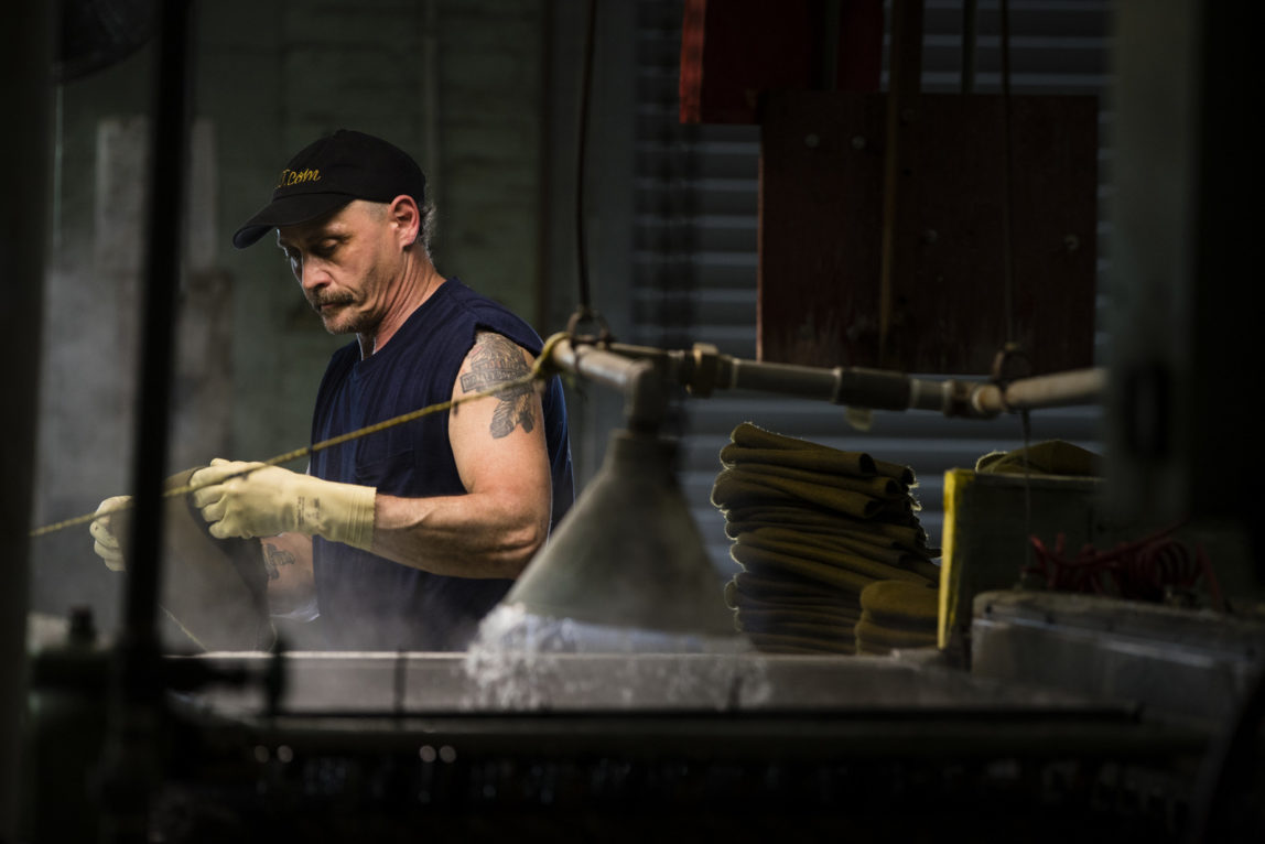 A worker takes part in the manufacturing of hats the Bollman Hat Company in Adamstown, Pa. (AP/Matt Rourke)