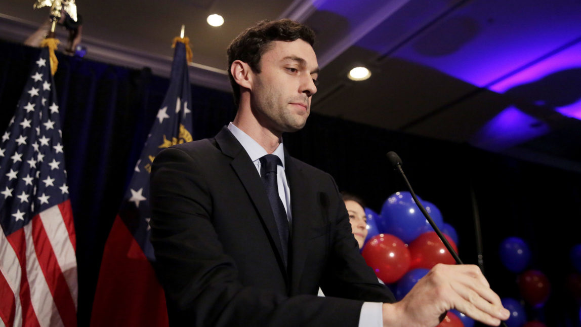 Democratic candidate for 6th congressional district Jon Ossoff adjusts his microphone as he concedes to Republican Karen Handel at his election night party in Atlanta, June 20, 2017. (AP/David Goldman)