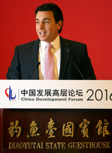 Ford CEO Mark Fields speaks during the opening ceremony of the China Development Forum at the Diaoyutai State Guesthouse in Beijing, (AP/Mark Schiefelbein)