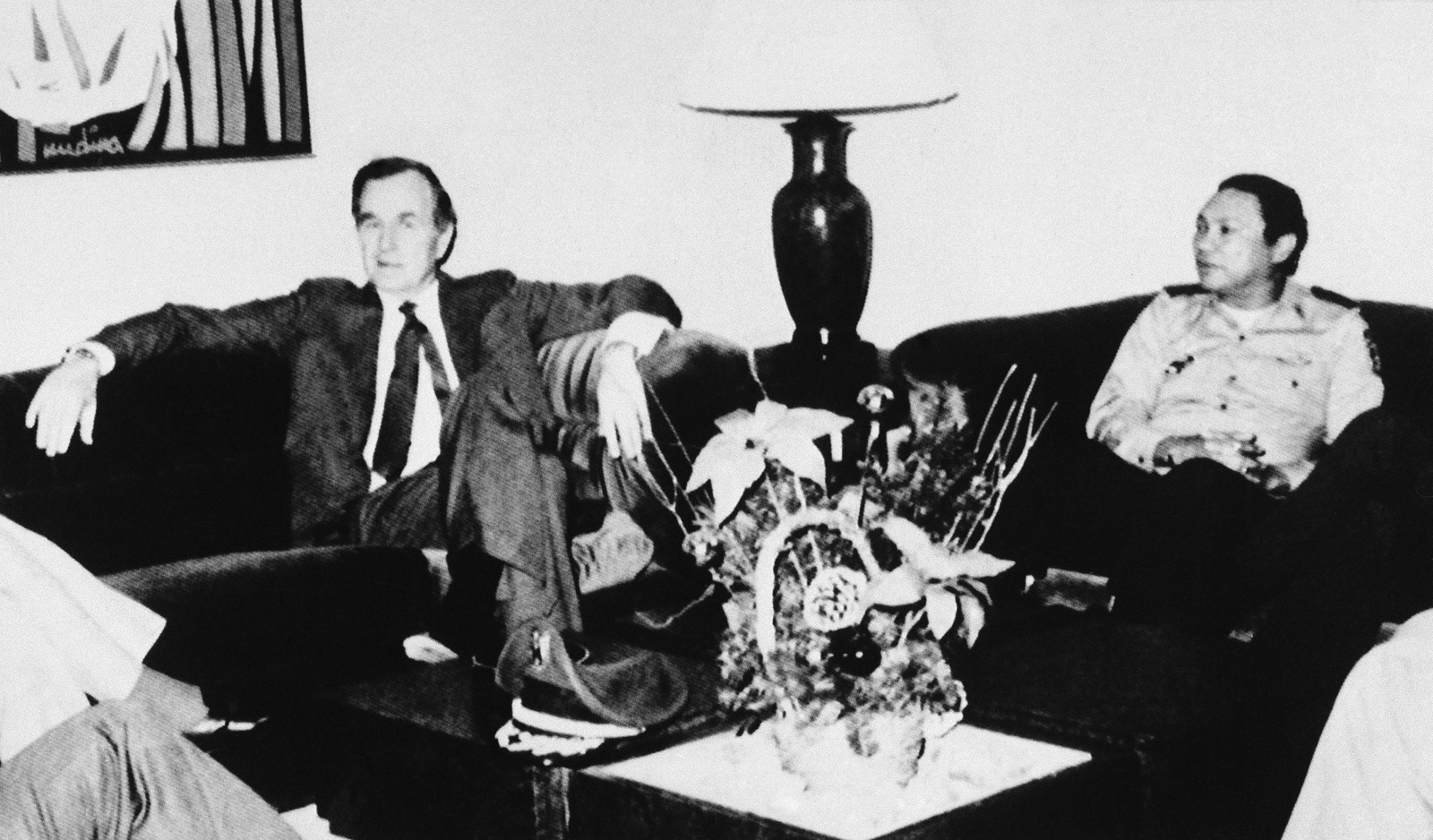 Vice-President George Bush meeting Panamanian leader Gen. Manuel Antonio Noriega at Panama City Airport in Panama City, Dec. 10, 1983. (AP Photo)