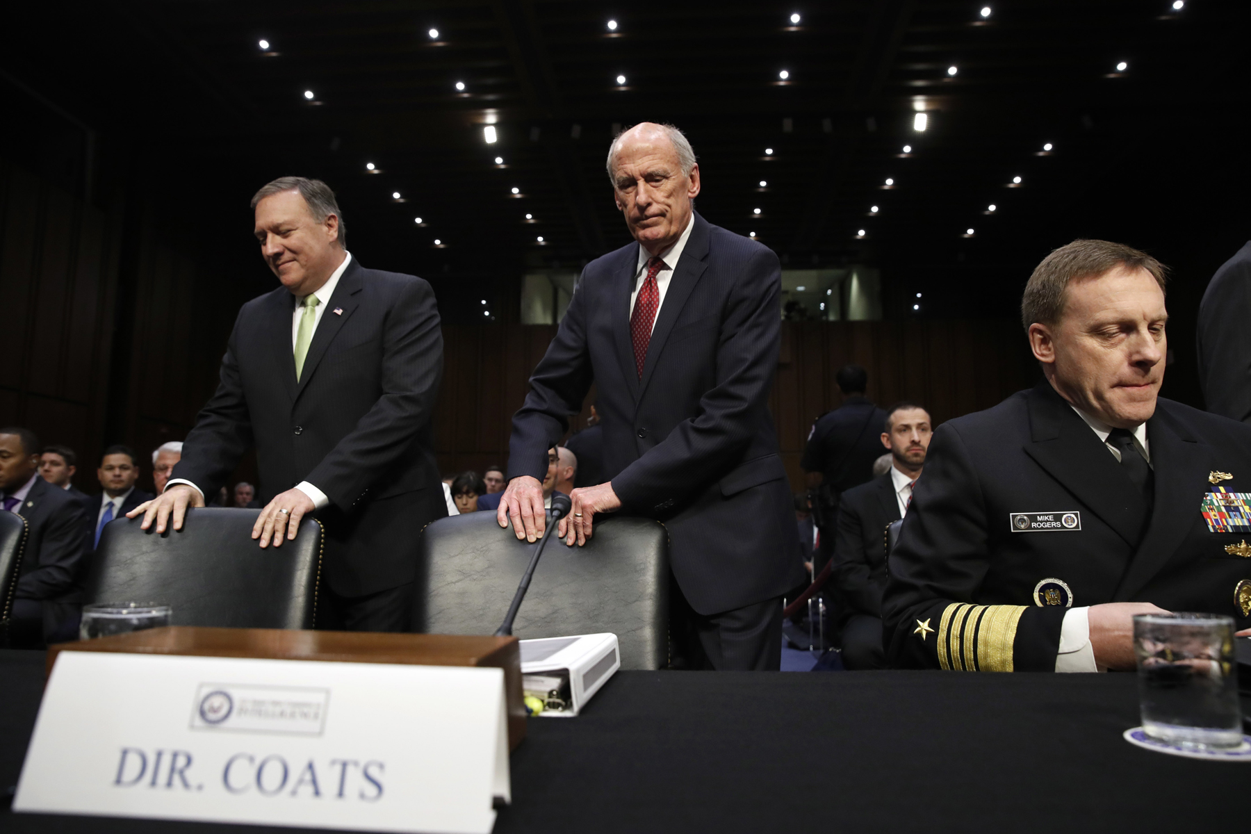 CIA Director Mike Pompeo (left), Director of National Intelligence Dan Coats, and National Security Agency Director Adm. Michael Rogers take their seats on Capitol Hill in Washington, May 11, 2017, prior to testifying before the Senate Intelligence Committee hearing on major threats facing the U.S. (Photo: Jacquelyn Martin/AP)