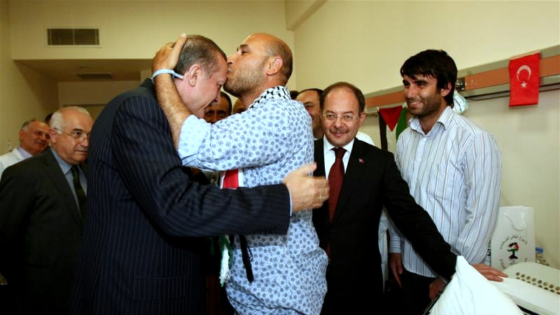 Libyan-Irish Mahdi al-Harati kisses Turkey's Prime Minister Recep Tayyip Erdogan's head during a visit to the wounded passengers of the Gaza-bound Mavi Marmara aid flotilla in the Ataturk Hospital in Ankara, Turkey, June, 2010. 
