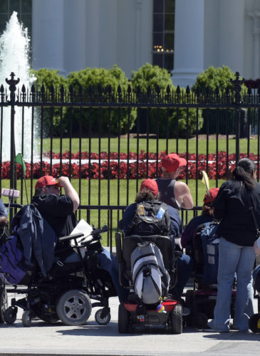 Protesters supporting people with disabilities gather outside the White House in Washington, May 15, 2017. (AP Photo/Susan Walsh)
