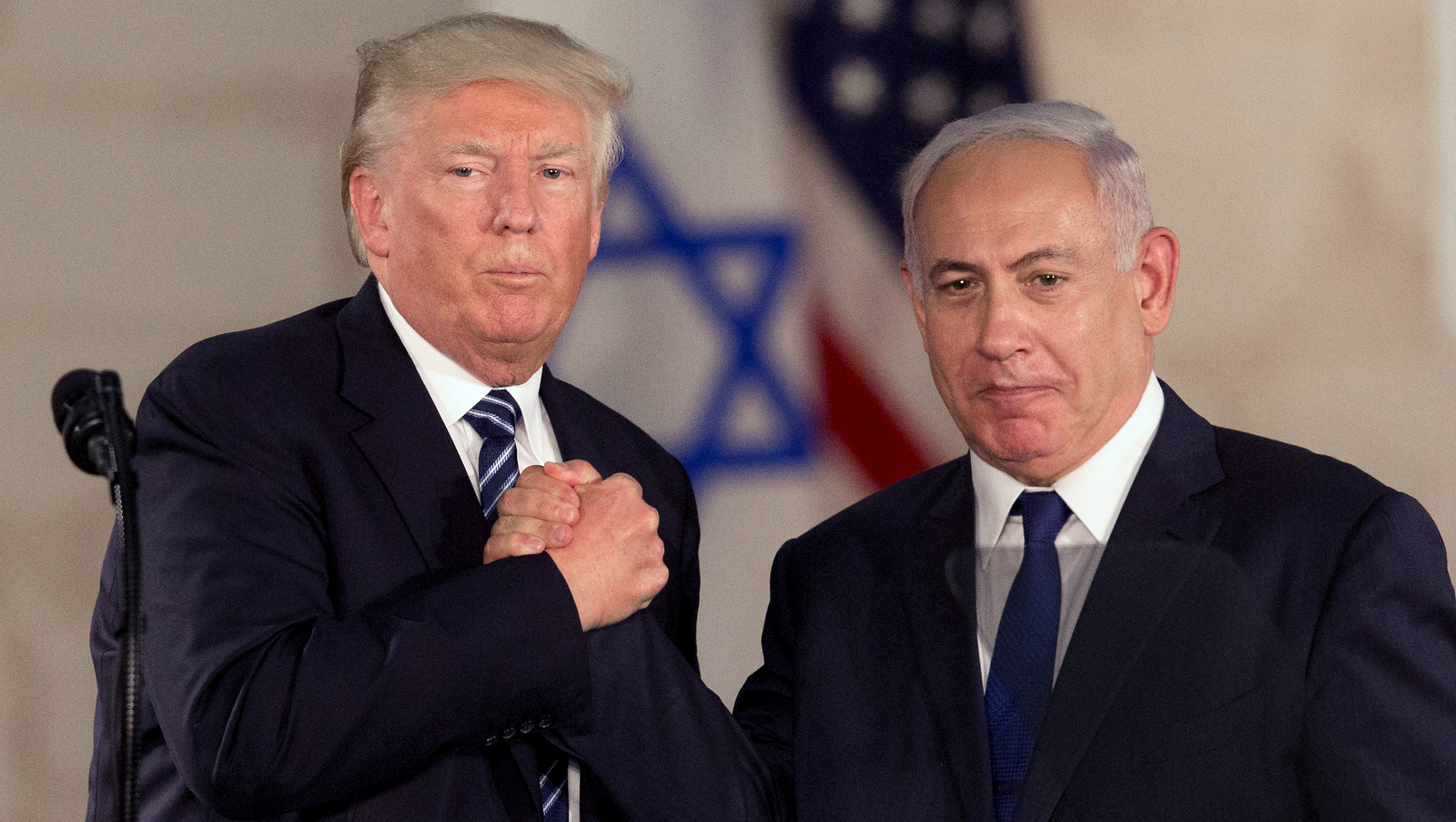 U.S. President Donald Trump and Israeli Prime Minister Benjamin Netanyahu shake hands at the Israel Museum, in Jerusalem, May 23, 2017. (AP/Sebastian Scheiner)