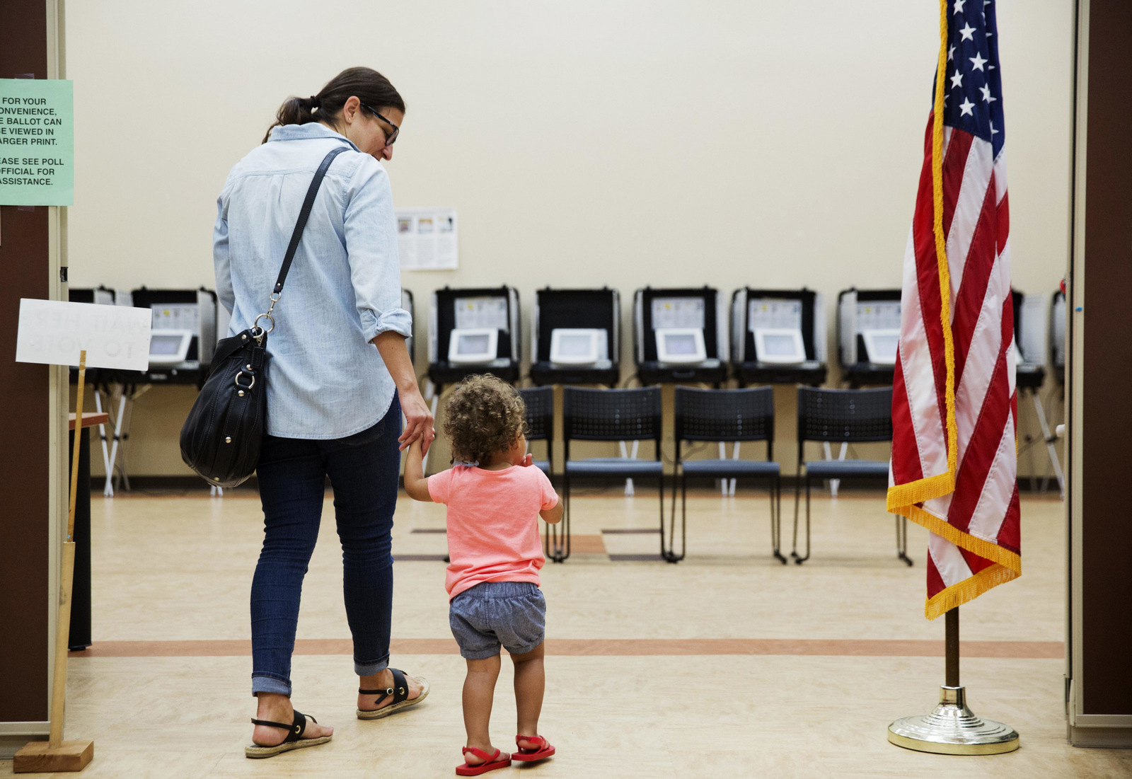 Melissa Painter walks with her daughter to vote in Georgia's 6th Congressional District special election at a polling site in Sandy Springs, Ga., June 20, 2017. (AP/David Goldman)