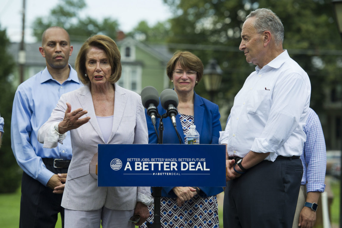 Nancy Pelosi, accompanied by, Hakeem Jeffries, D-N.Y., Sen. Amy Klobuchar, D-Minn. and Chuck Schumer of N.Y. speaks in a park in Berryville, Va., July 24, 2017, where they unveiled the Democrats new agenda. (AP/Cliff Owen)
