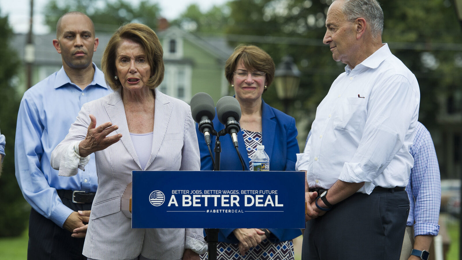 Nancy Pelosi, accompanied by, Hakeem Jeffries, D-N.Y., Sen. Amy Klobuchar, D-Minn. and Chuck Schumer of N.Y. speaks in a park in Berryville, Va., July 24, 2017, where they unveiled the Democrats new agenda. (AP/Cliff Owen)