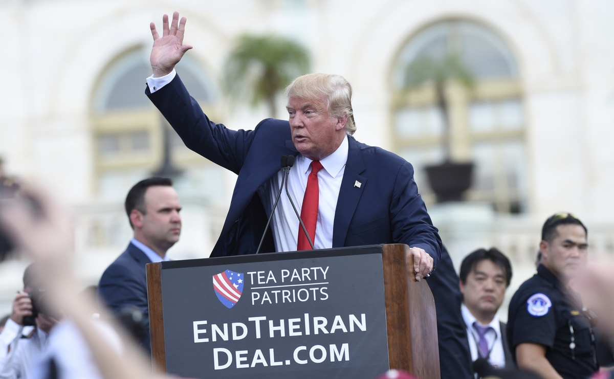 Republican presidential candidate Donald Trump waves to the crowd after speaking during a rally opposing the Iran nuclear deal outside the Capitol in Washington, Sept. 9, 2015. (AP/Susan Walsh)