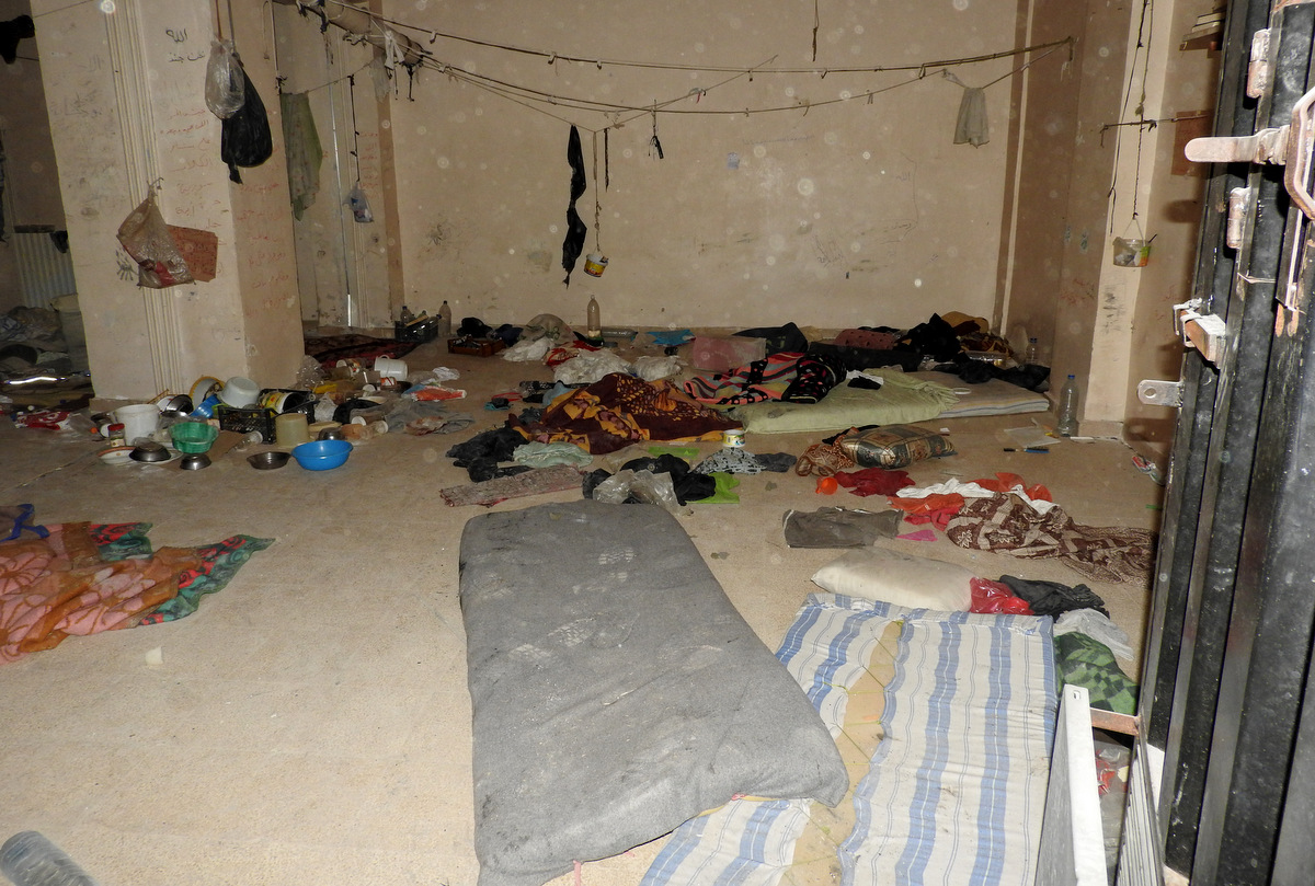  A room used to imprison tens of civilians in the underground prison in the Eye Hospital complex, Aleppo Syria, June, 2017. (Eva Bartlett/MintPress News)