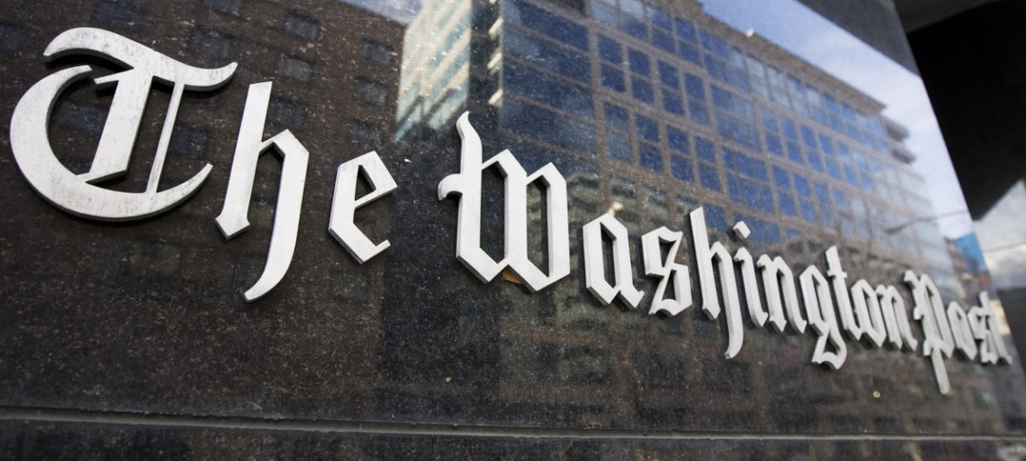 The Washington Post sign is seen on its building in Washington, Feb. 27, 2008. (AP/Manuel Balce Ceneta)