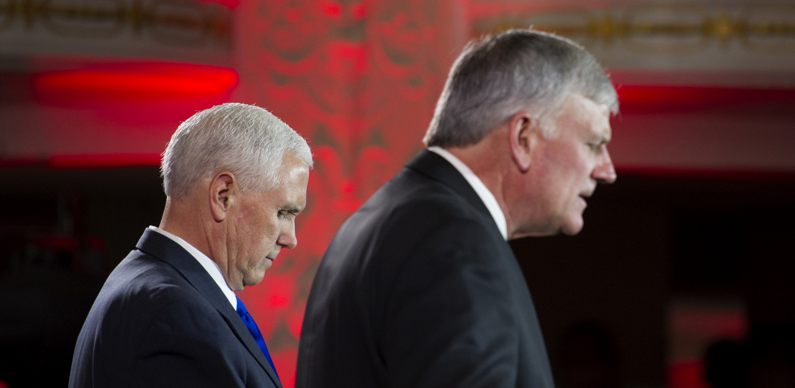 Franklin Graham, right, prays for Vice President Mike Pence during the World Summit in Defense of Persecuted Christians hosted by Graham, and the Billy Graham Evangelistic Association, May 11, 2017, in Washington. (AP/Cliff Owen)