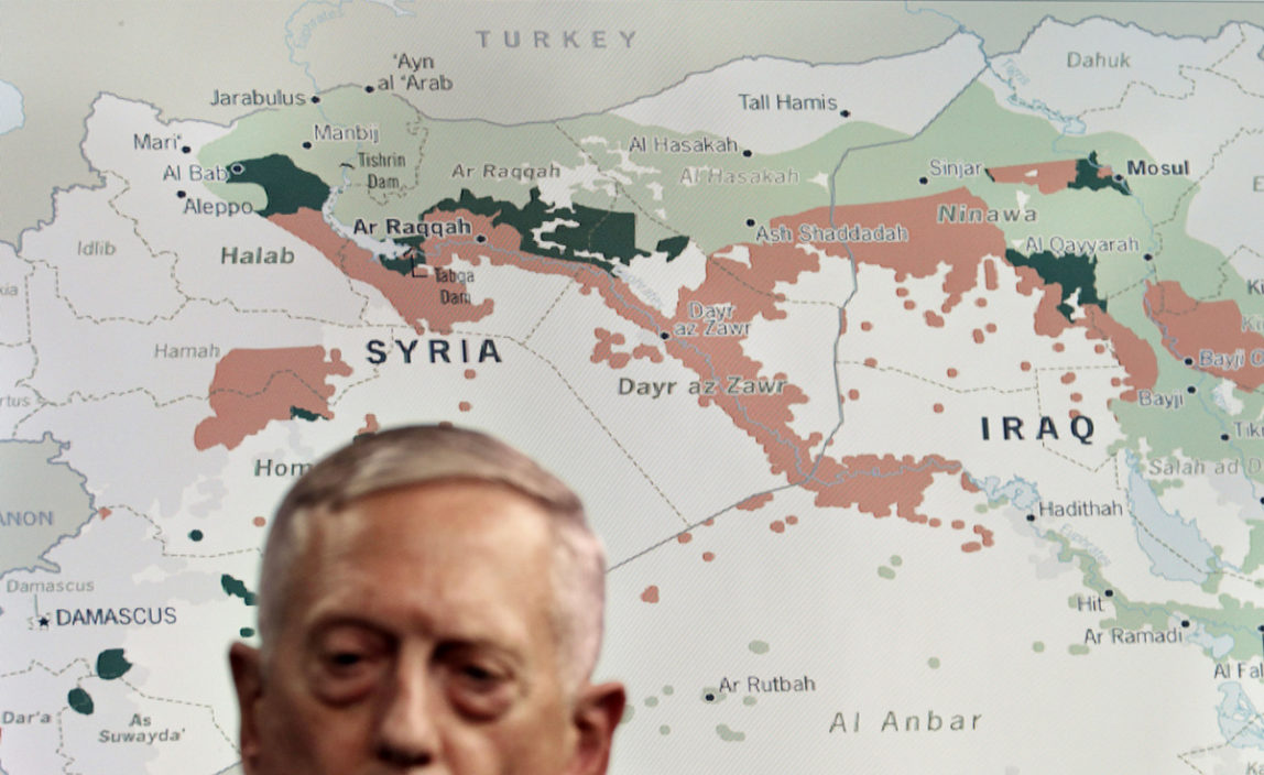 Secretary of Defense Jim Mattis stands in front of a map of Syria and Iraq ISIS, during an update to the media, Friday, May 19, 2017, at the Pentagon. (AP/Jacquelyn Martin)