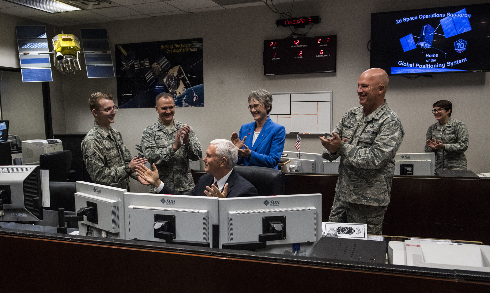 Vice President Mike Pence learns how to send a command to a satellite dish while touring the 2d Space Operations Squadron, Home of the Global Positioning System, at Schriever Air Force Base Friday, June 23, 2017, during his visit to Colorado Springs, Colo. (Christian Murdock/The Gazette via AP)