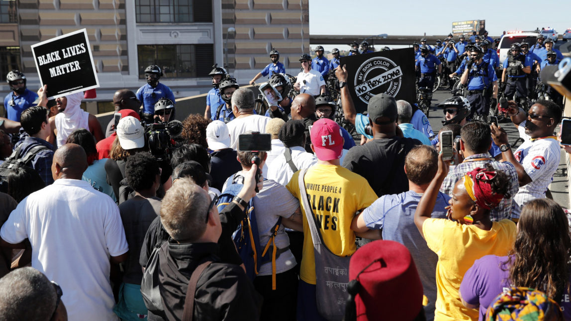 Protesters gather outside of the courthouse, Sept. 15, 2017, in downtown St. Louis, after a judge found a white former St. Louis police officer, Jason Stockley, not guilty of first-degree murder in the death of a black man, Anthony Lamar Smith, who was fatally shot following a high-speed chase in 2011. (AP/Jeff Roberson)