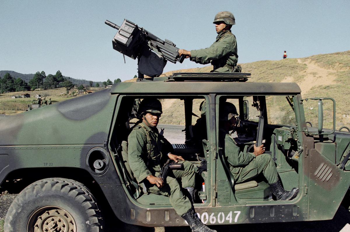 A well-equipped Mexican patrol travels down rural roads in Chiapas, Mexico Feb. 1995, during President Ernesto Zedillos Israeli-aided crackdown on dissidents in Chiapas State. (AP/Damian Dovarganes)