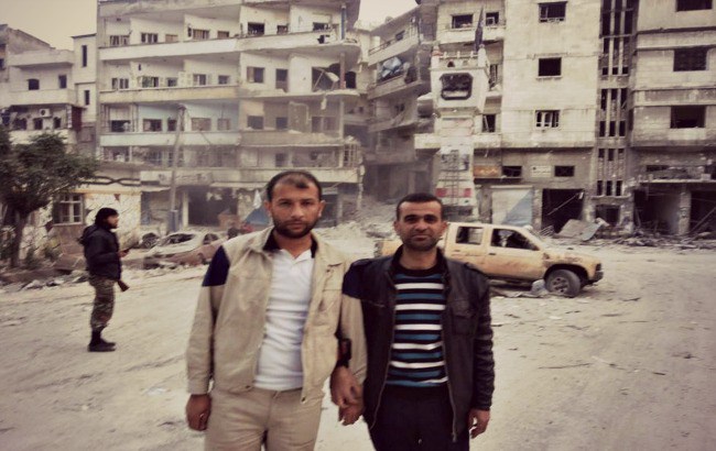 Raed Saleh photographed with Mustafa Al Haj Yussef, a White Helmets leader, in Khan Sheikhoun, Idlib. (Photo: Facebook)