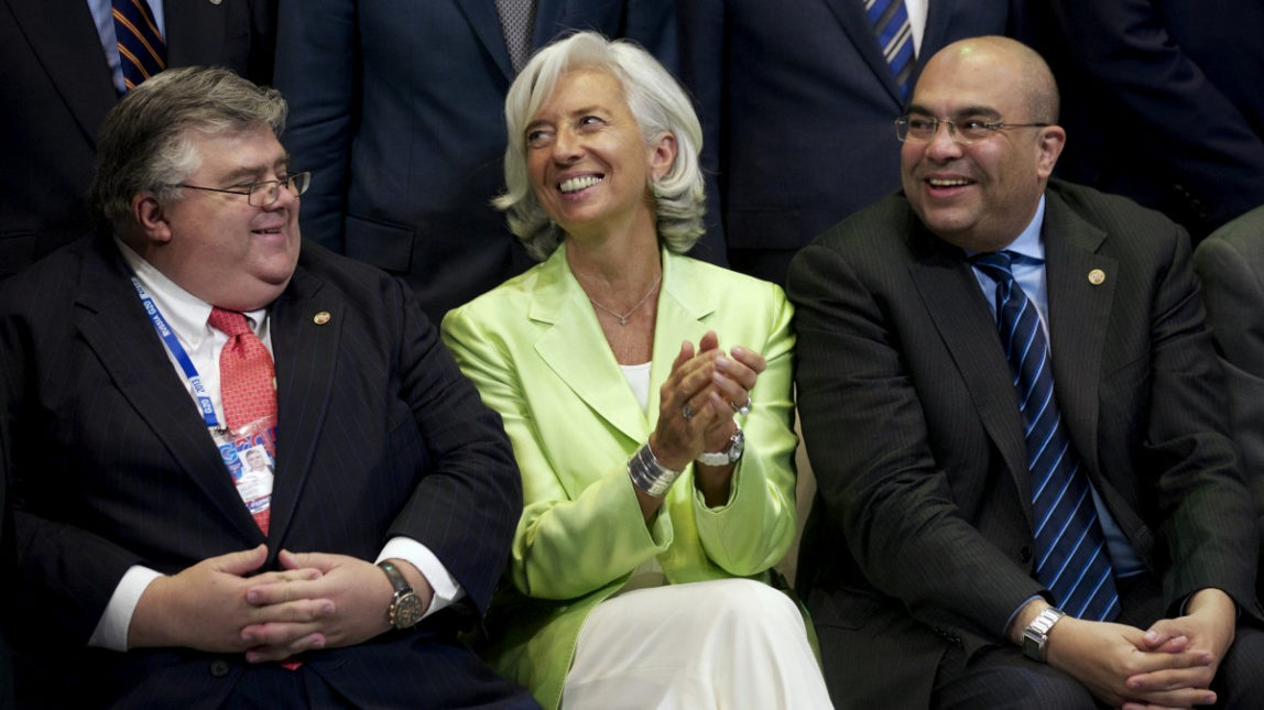 From left, Mexico's Central Bank Governor Agustin Carstens, Managing Director of the International Monetary Fund Christine Lagarde, and Special Envoy for the President of the World Bank Mahmoud Mohieldin pose for a group photo after a meeting of the Group of 20 finance ministers in Moscow, Russia, Saturday, July 20, 2013. The finance chiefs of the world's leading economies hope to force multinational companies to pay more taxes by closing loopholes that have allowed them to stash profits overseas. (AP/Alexander Zemlianichenko)