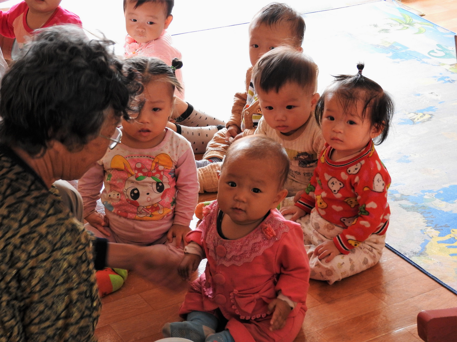 Inside the child-care center of the Jangchon Cooperative Farm. The cooperative also includes a cultural center for meetings and events, and rows of greenhouses.