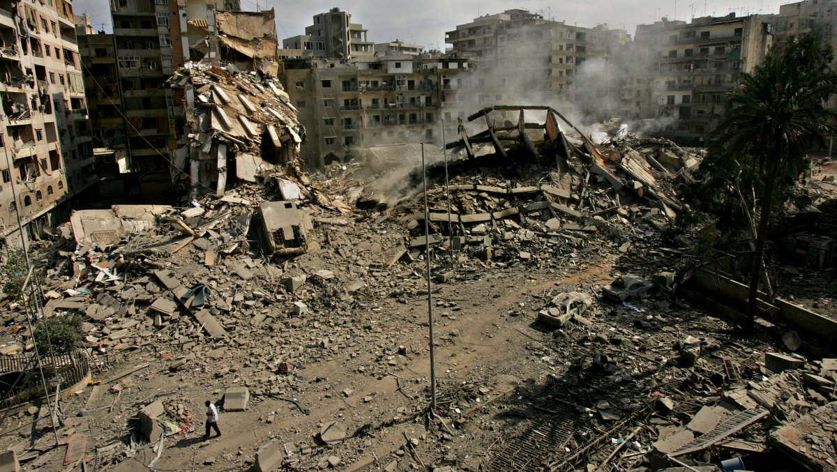 Destruction in a residential area that was destroyed in an Israeli bombardment is seen in the southern suburbs of Beirut, on this Aug. 15, 2006. (AP/Kevin Frayer)