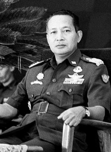 FILE - In this March 12, 1967, file photo. Gen. Suharto, is seated during a ceremony in Jarkata, Indonesia, in which he was formally sworn-in by Congress as the new acting president replacing President Sukarno. It was the darkest episode in Indonesia’s modern history: a bloody anti-communist purge that left perhaps a half-million people dead. (AP Photo)