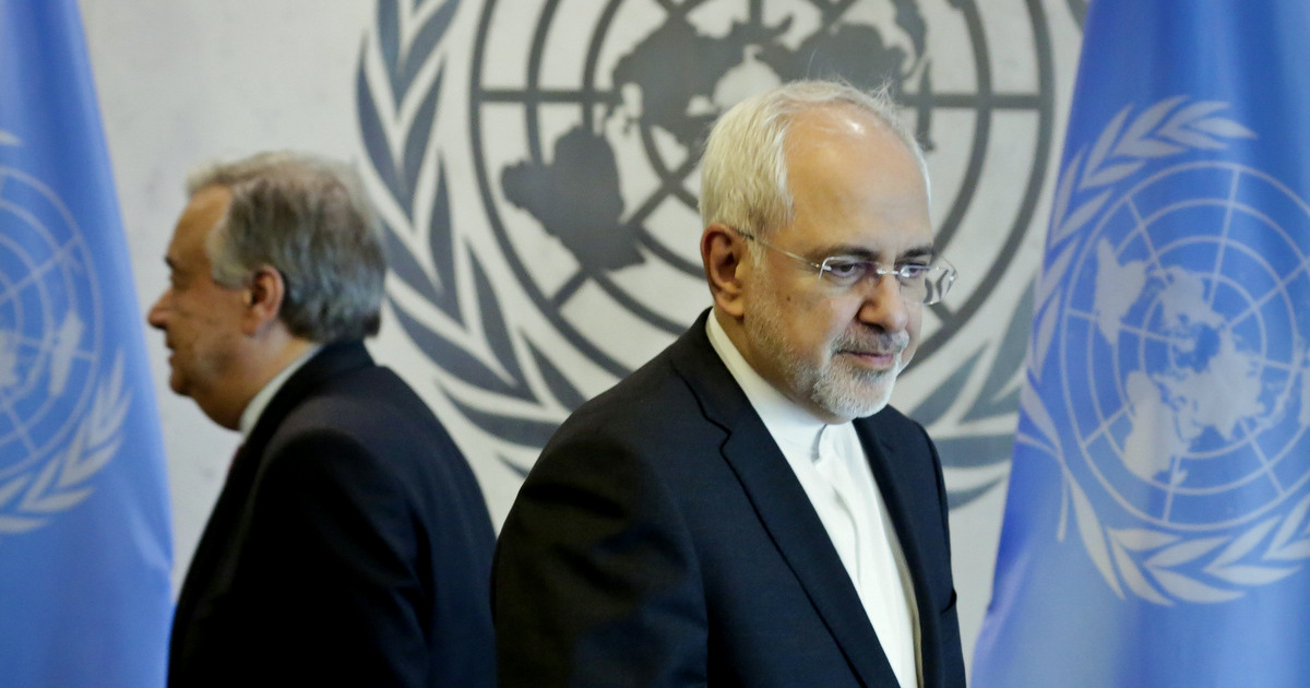 United Nations Secretary-General Antonio Guterres, left, and Iran's Foreign Minister Javad Zarif prepare to take their seats for a meeting, Monday, July 17, 2017, at U.N. headquarters. (AP Photo/Bebeto Matthews)