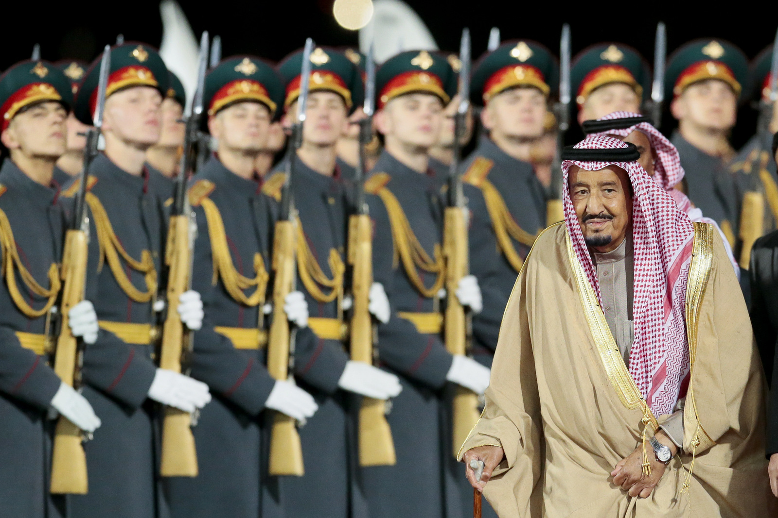 Saudi King Salman reviews a honor guards upon arrival in Moscow's Government Vnukovo airport, Russia, Wednesday, Oct. 4, 2017. The King's visit is the first trip to Russia by a sitting Saudi monarch. (AP/Ivan Sekretarev)