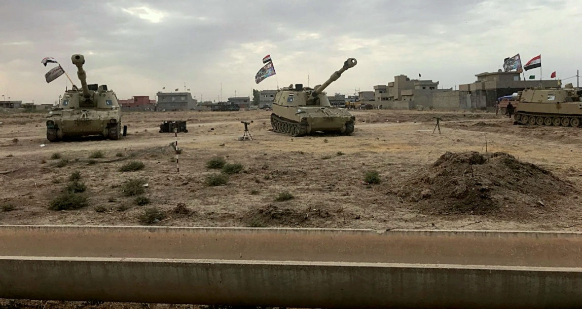 Iraqi tanks deploy in the village of Bashir, south of Kirkuk, Iraq, Friday, Oct. 13, 2017. Kurdish forces have withdrawn from the edges of a disputed region in northern Iraq, a commander said Friday, amid tensions with Iraq's central government over the administration of the oil-rich city of Kirkuk. (AP/Emad Matti)