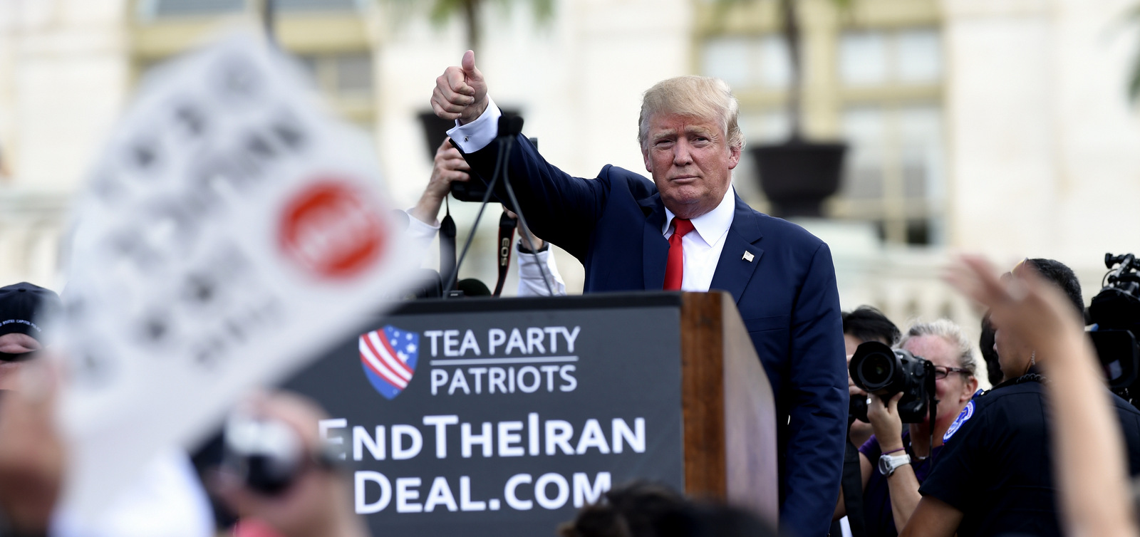 Republican Presidential candidate Donald Trump gives a thumbs up to the crowd after speaking during a rally opposing the Iran nuclear deal outside the Capitol in Washington, Wednesday, Sept. 9, 2015. (AP/Susan Walsh)