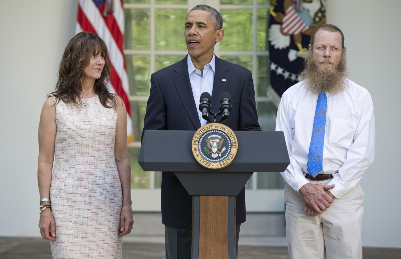 President Barack Obama, accompanied by Jani Bergdahl, left, and Bob Bergdahl, speaks during a news conference in the Rose Garden of the White House in Washington on Saturday, May 31, 2014 about the release of their son, U.S. Army Sgt. Bowe Bergdahl. (AP/Carolyn Kaster)