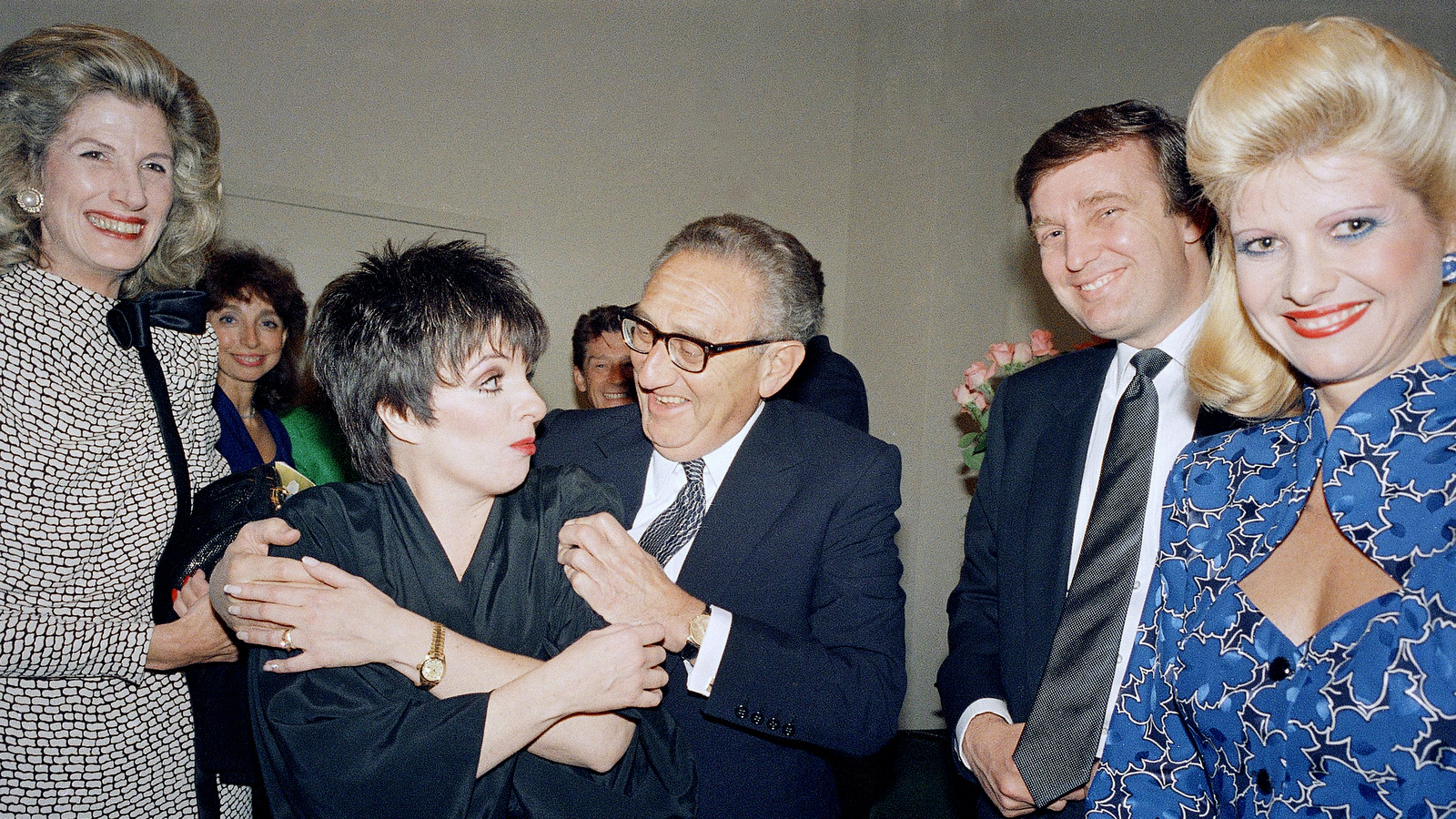 Henry Kissinger and Nancy Kissinger, Donald Trump and wife Ivana Trump backstage at a Liza Minelli show in New York, June 11, 1987. (AP/Ron Frehm)