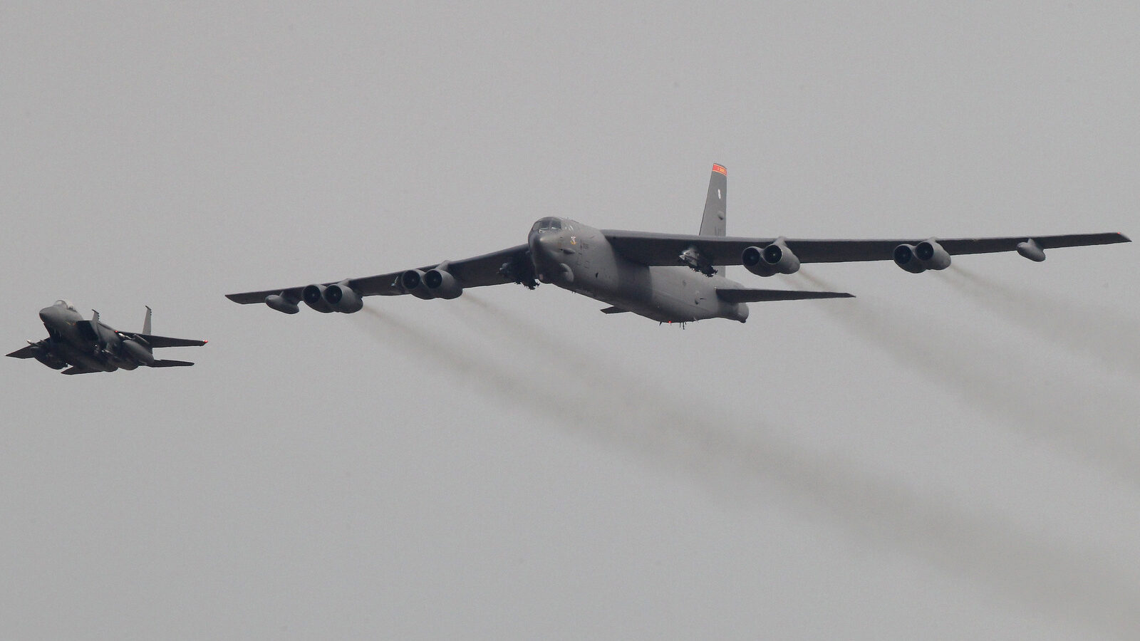 A U.S. Air Force B-52 bomber flies over Osan Air Base in Pyeongtaek, South Korea, Sunday, Jan. 10, 2016. The powerful U.S. B-52 bomber flew low over South Korea recently, a clear show of force from the United States as a Cold War-style standoff deepened between its ally Seoul and North Korea following Pyongyang's fourth nuclear test. (AP/Ahn Young-joon)