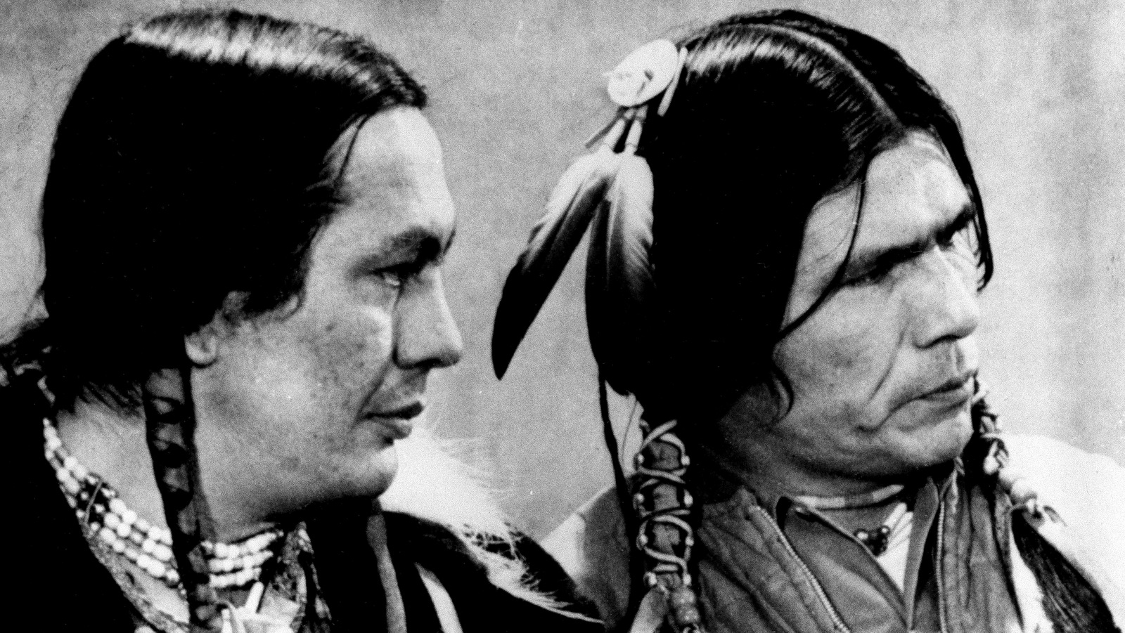 Russell Means, left, and Dennis Banks, American Indian Movement (AIM) leaders are shown on trial in St. Paul, Minn., April 12, 1974. They are on trial for the occupation of Wounded Knee, S.D. in 1973. Means and Banks say the government is on trial, not them and predict they will be victorious. (AP Photo)
