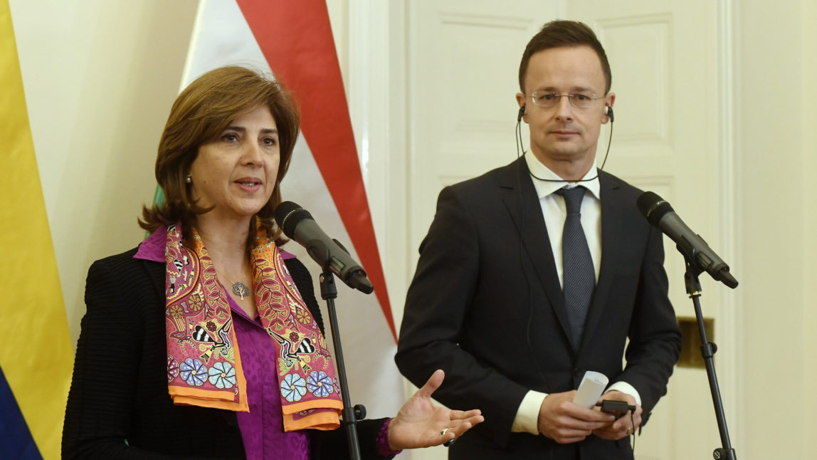Hungarian Minister of Foreign Affairs and Trade Peter Szijjarto, right, and Minister of Foreign Affairs of Colombia Maria Angela Holguin Cuellar during their press conference at the Ministry of Foreign Affairs and Trade in Budapest, Hungary,, Nov. 15, 2017. (Szilard Koszticsak/MTI via AP)