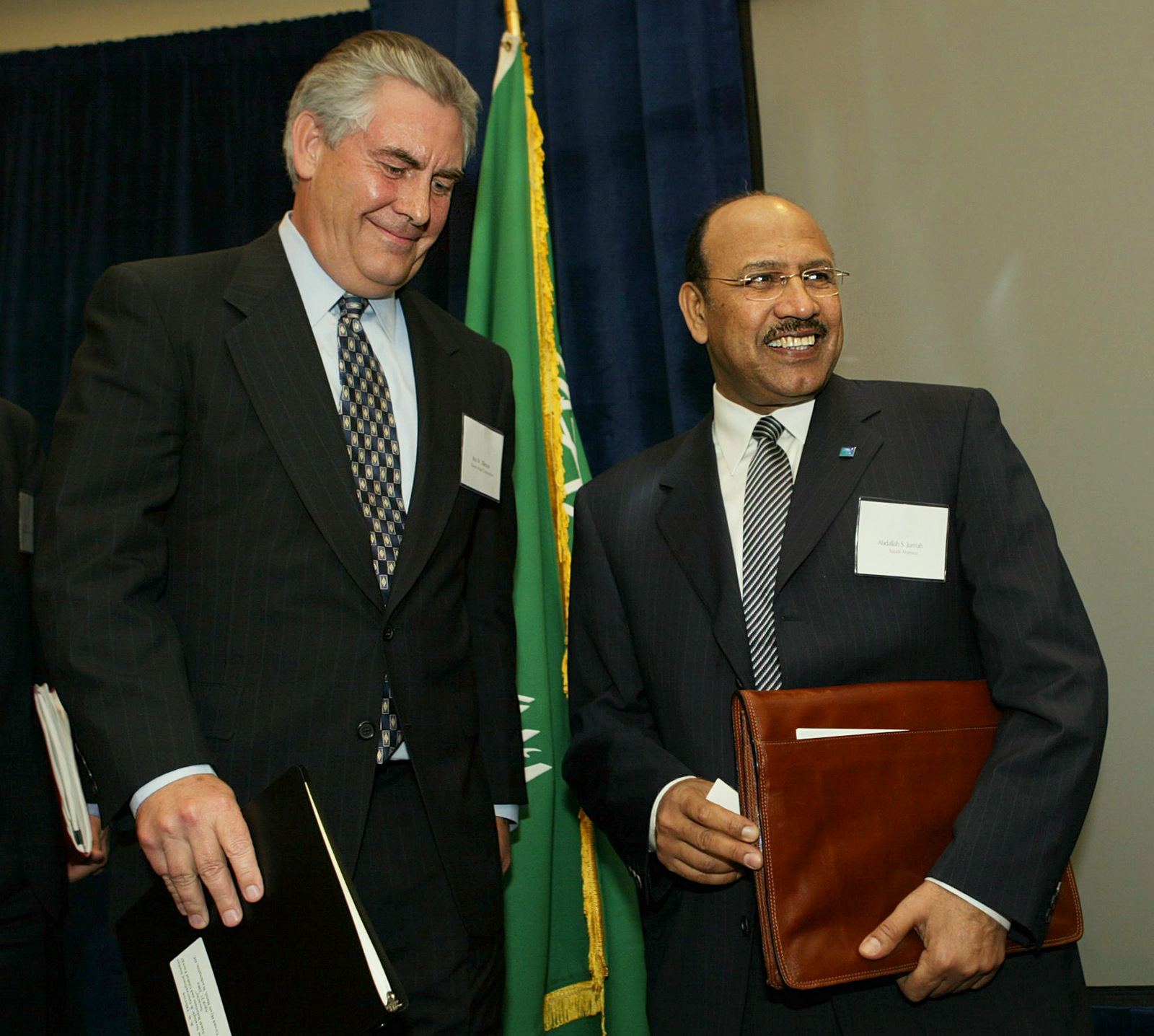 Saudi Aramco President and CEO Abdallah S. Jum'ah, right and Exxon Mobil Corporation President Rex Tillerson, attend a forum on U.S.-Saudi Relations and Global Energy Security, Tuesday, April 27, 2004, in Washington. (AP/Manuel Balce Ceneta)