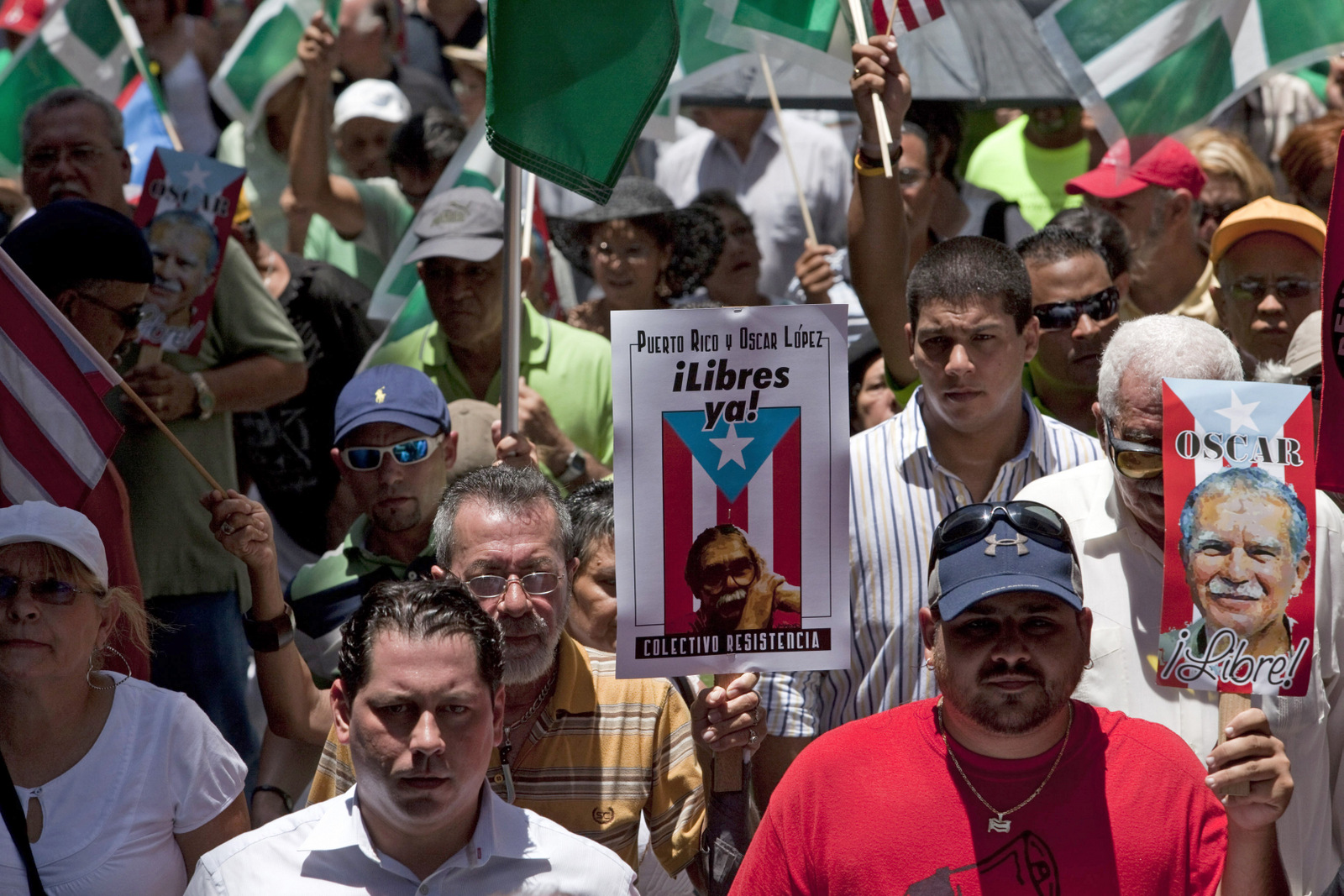 Pro-independence demonstrators march demanding the release of political prisoners in San Juan, Puerto Rico, Tuesday, June 14, 2011. Obama's trip marks the first visit to Puerto Rico by a sitting U.S. President since John F. Kennedy's 1961 visit. (AP/Ramon Espinosa)