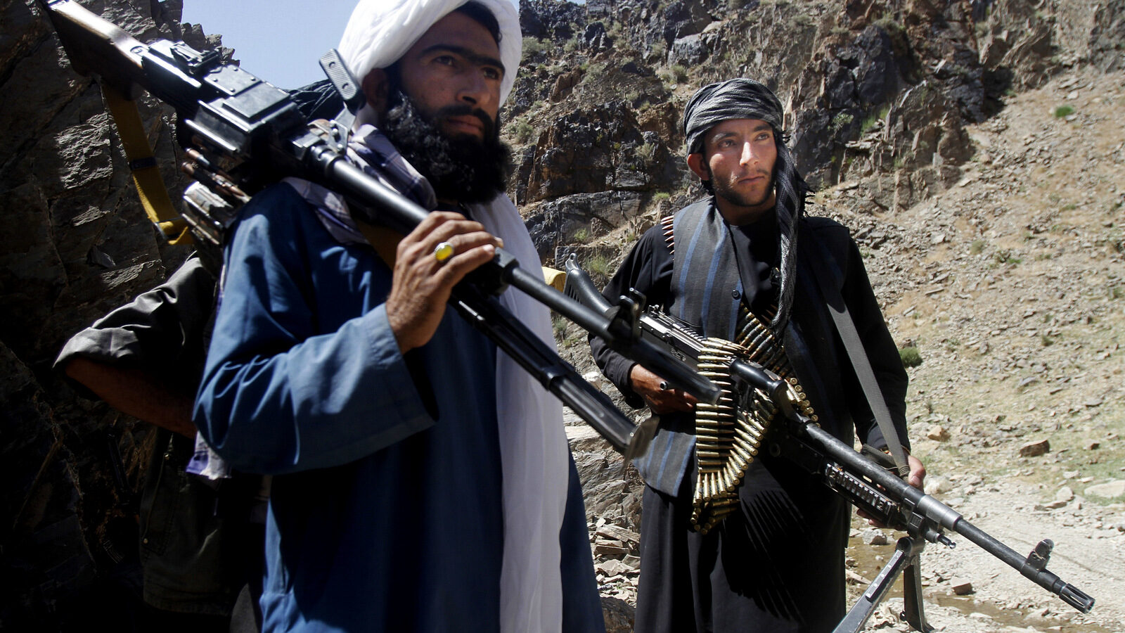 In this Friday, May 27, 2016 photo, members of a breakaway faction of the Taliban fighters prepare to guard a gathering , in Shindand district of Herat province, Afghanistan. (AP/Allauddin Khan)