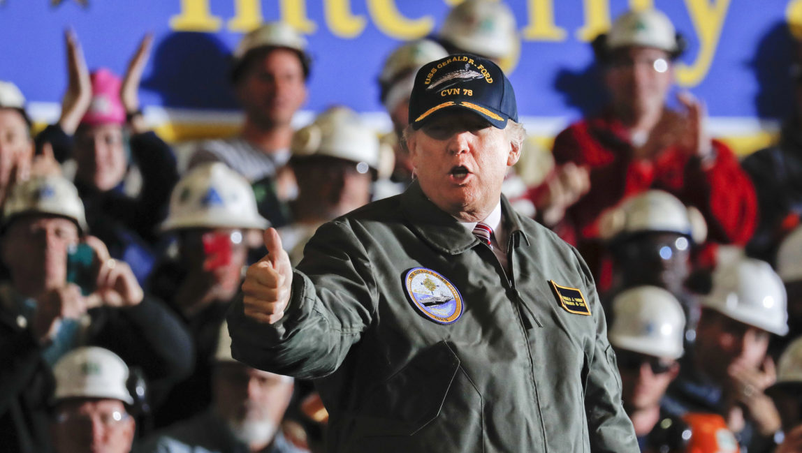 President Donald Trump gives a thumbs-up after speaking to Navy and shipyard personnel aboard the nuclear aircraft carrier Gerald R. Ford at Newport News Shipbuilding in Newport News, Va. (AP/Pablo Martinez Monsivais)