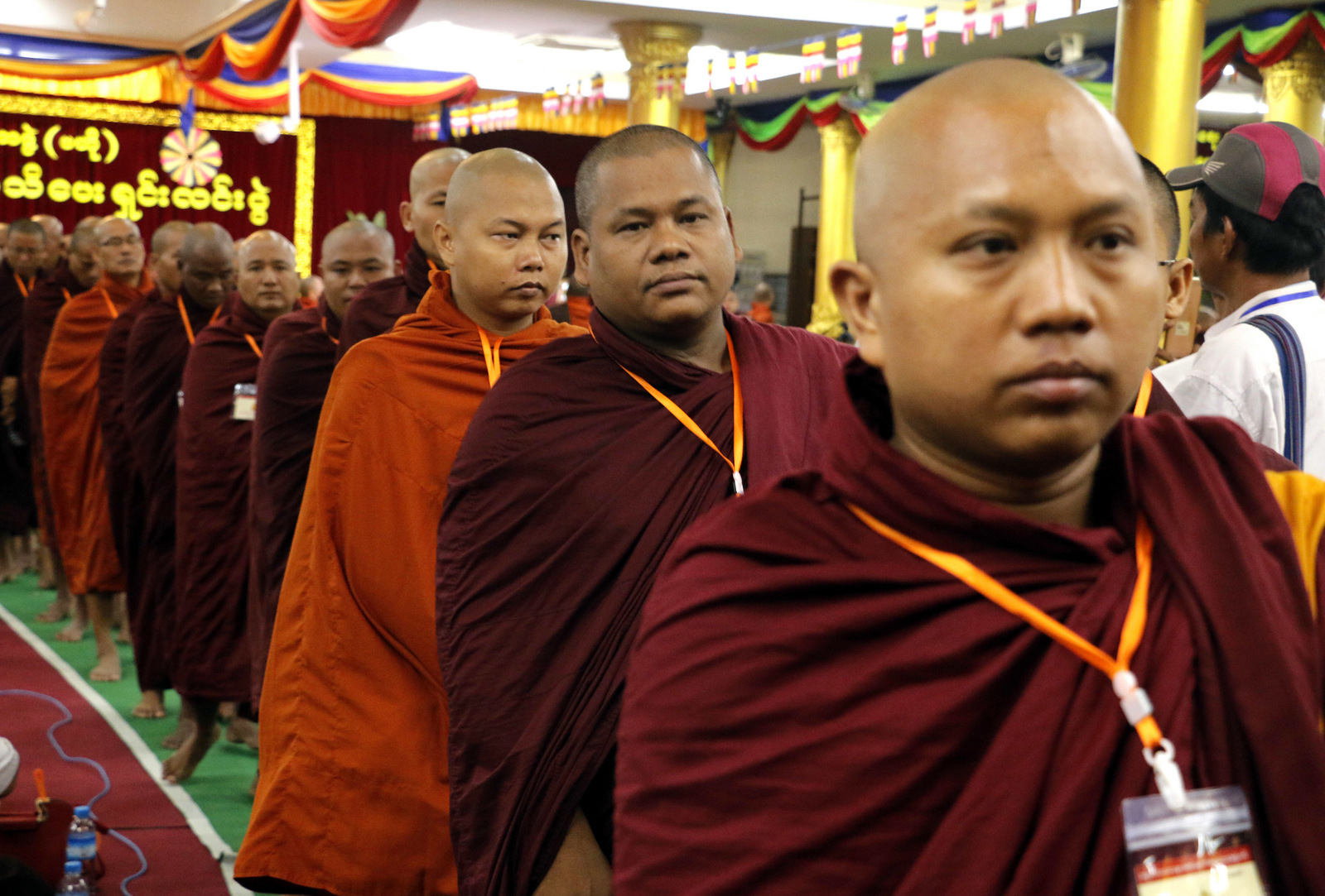 Myanmar Buddhist monks leave the venue for a break during the 4th anniversary of the nationwide meeting at a monastery, May 27, 2017, in Yangon, Myanmar. A hardline nationalist Buddhist group, known as the Ma Ba Tha, began a two-day long nationwide conference on Saturday despite the ban imposed by the country's highest Buddhist authority on all activities under the group's name. (AP/Thein Zaw)