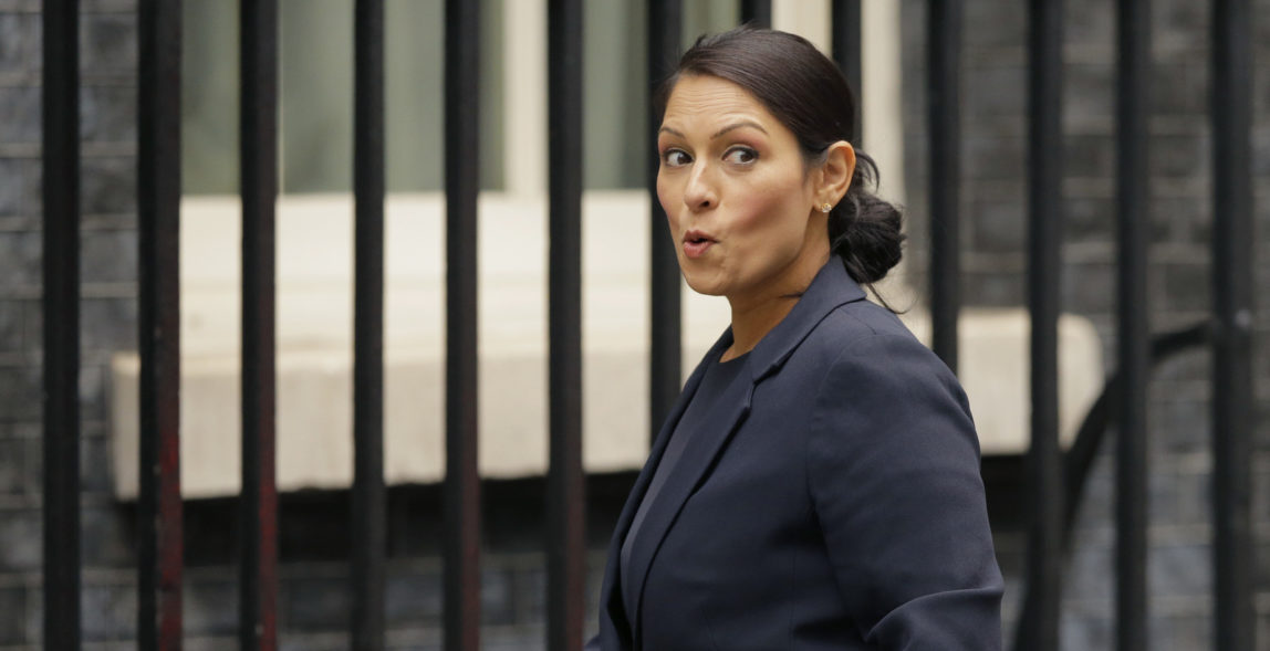 Britain's Secretary of State for International Development Priti Patel reacts to a question from the media as she arrives for a cabinet meeting at 10 Downing Street in London, Oct. 10, 2017. (AP/Alastair Grant)